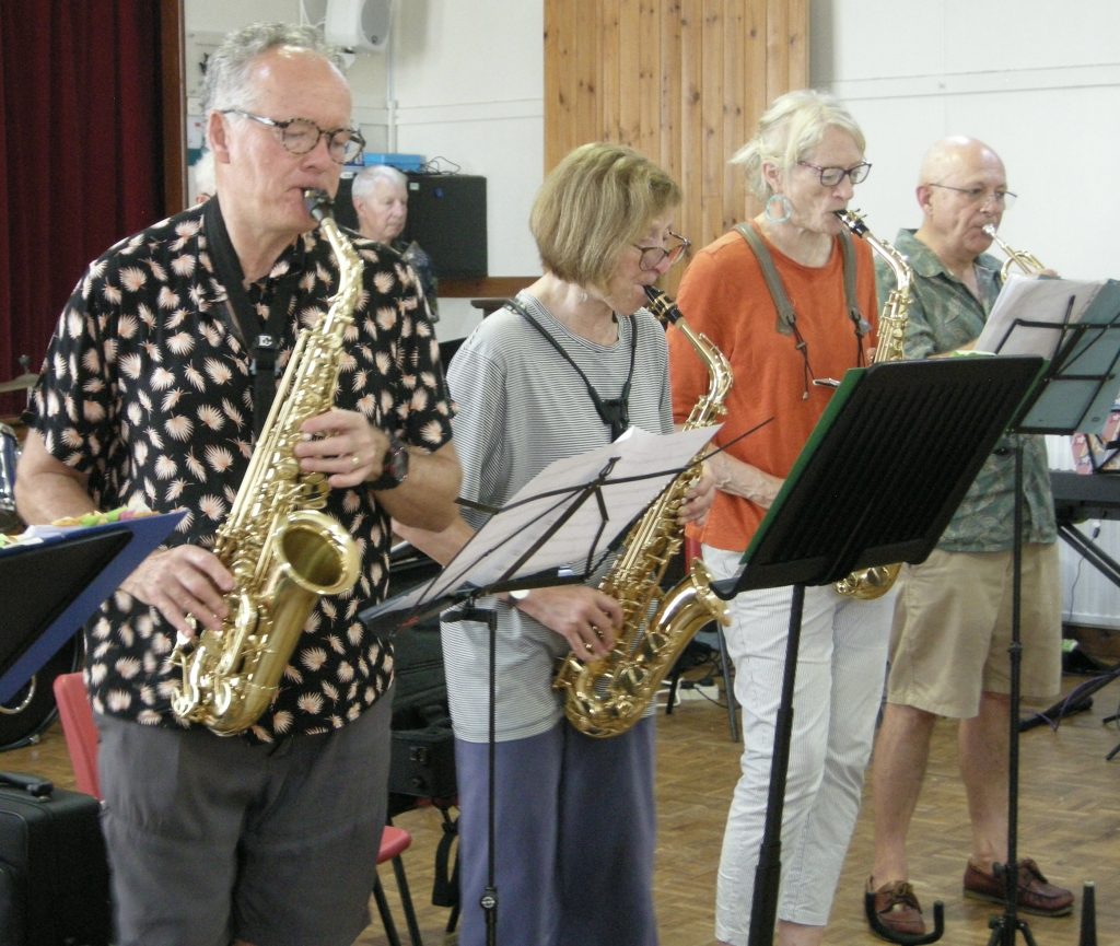 Soul Collective three sax players and one trumpet player